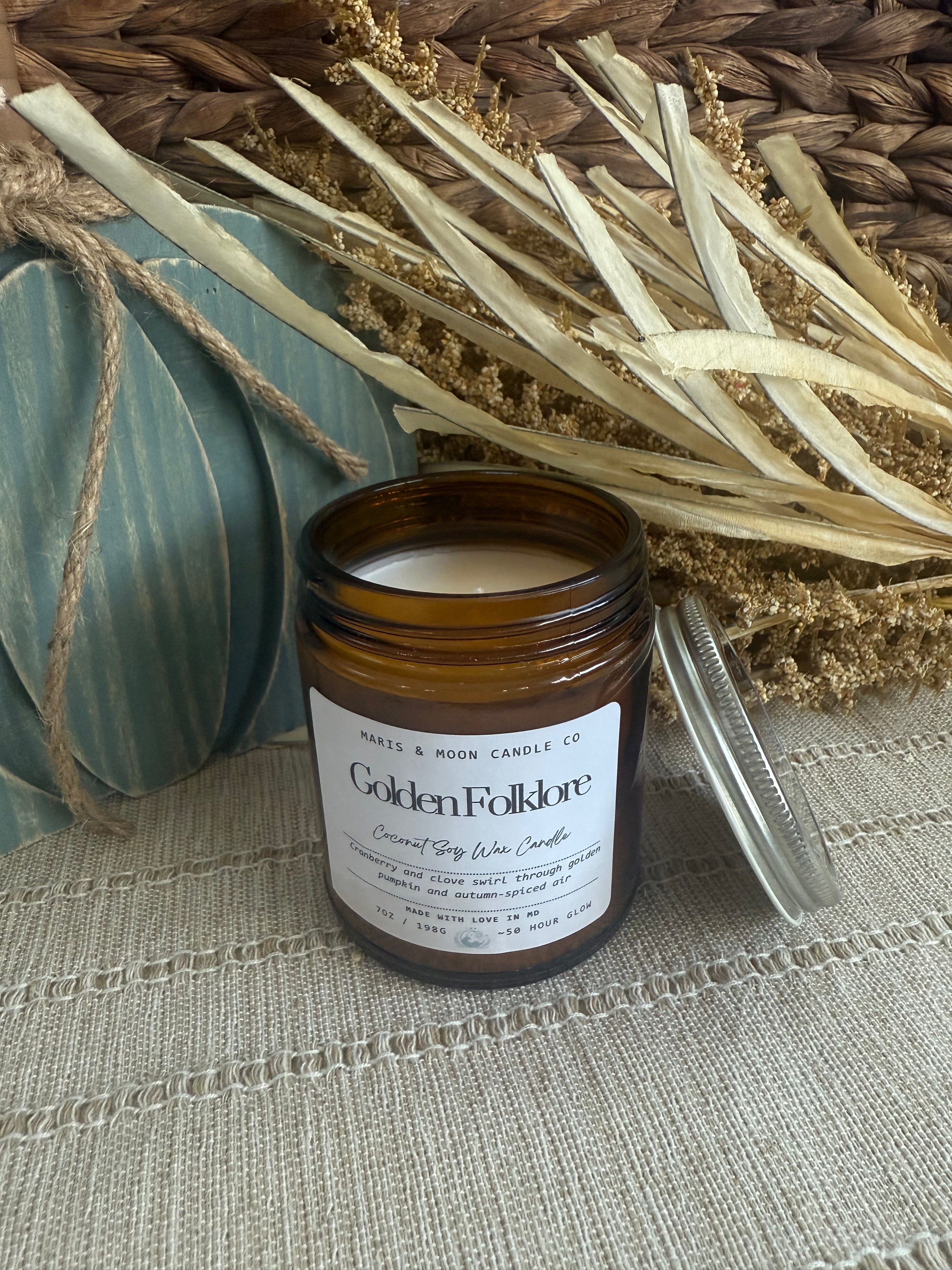 Golden Folklore 7oz amber glass candle with crystal