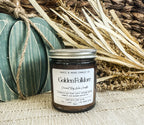 Golden Folklore 7oz amber glass candle with crystal