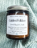Golden Folklore 7oz amber glass candle with crystal