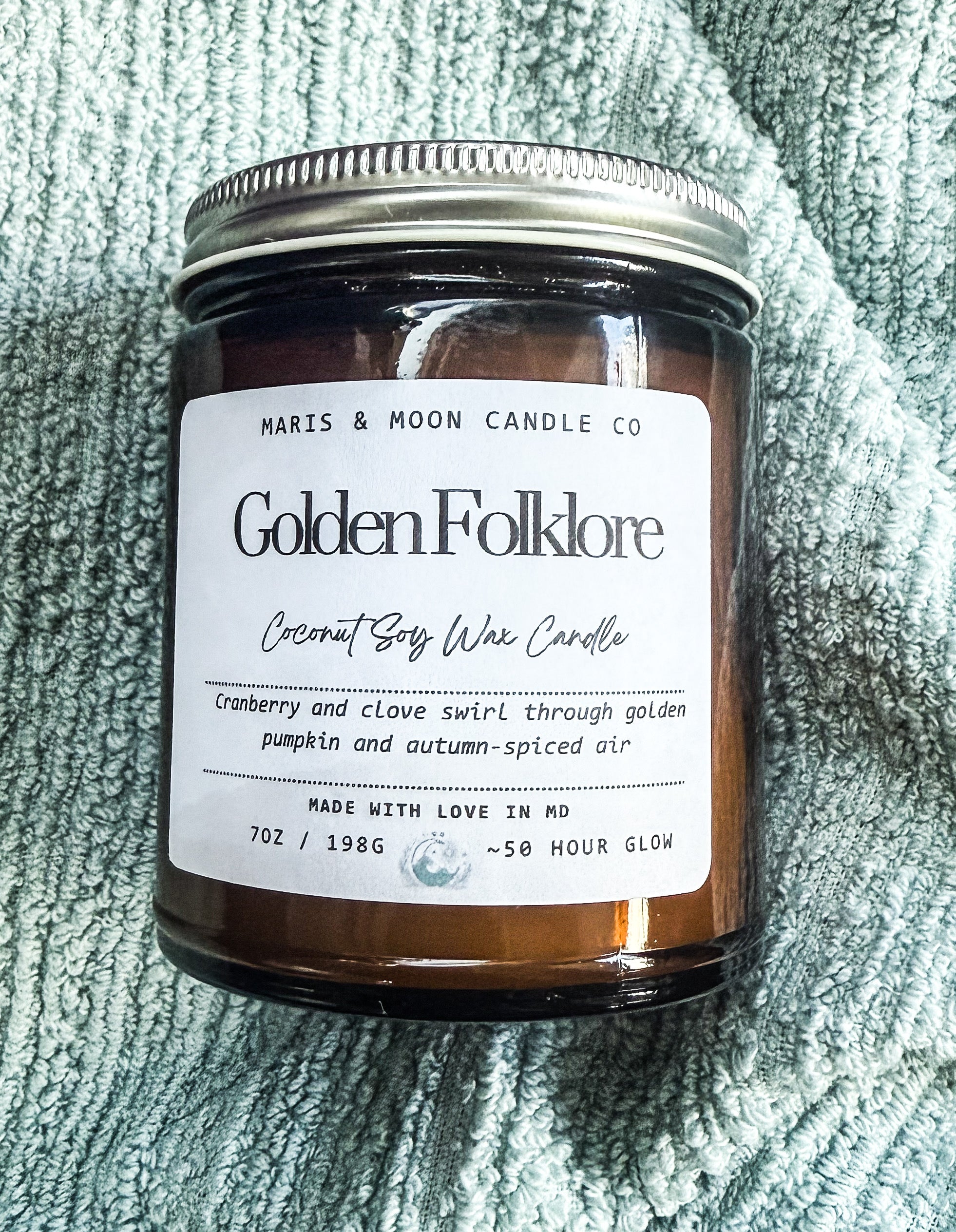 Golden Folklore 7oz amber glass candle with crystal